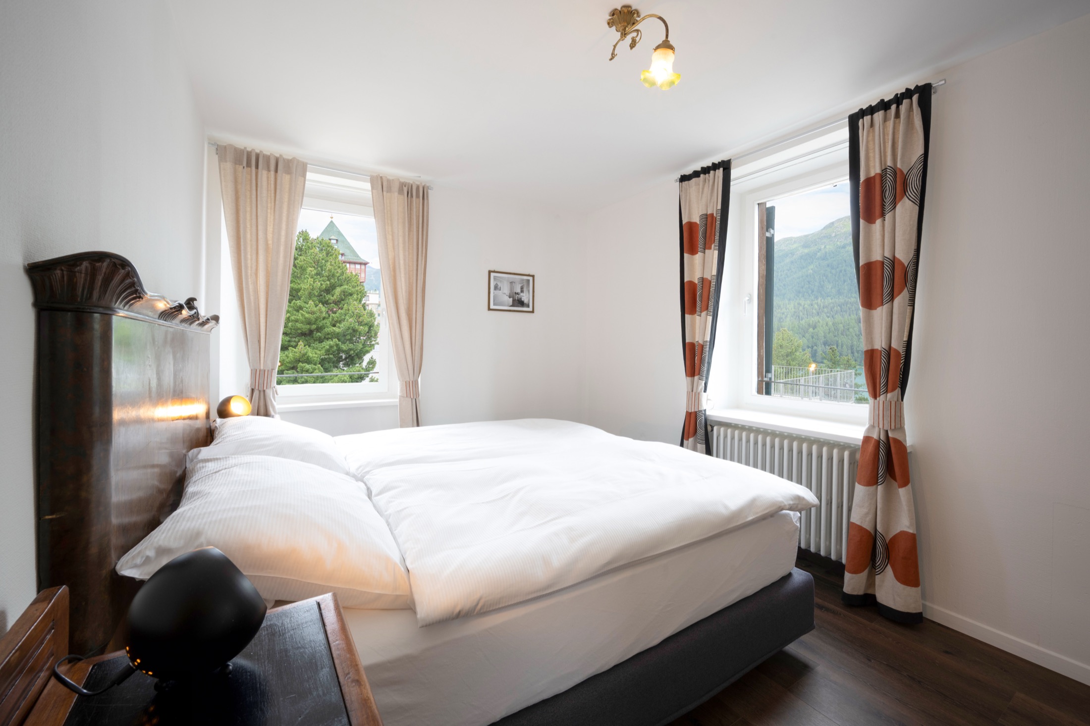 Il Retg, the Lake Junior Suite with Terrace at Villa Beaulieu — lake and mountain views